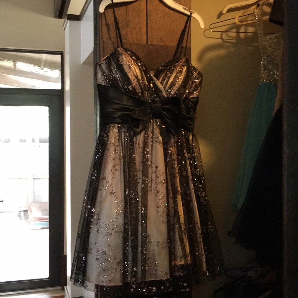 Champagne colored with black lace dress